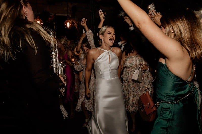 Bride Dances With Female Sax Player At Glasshaus Inside Melbourne