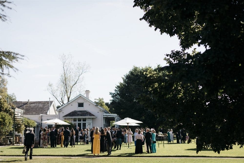 Guests Enjoy Drinks After Wedding Ceremony Outdoors At Coombe Yarra Valley