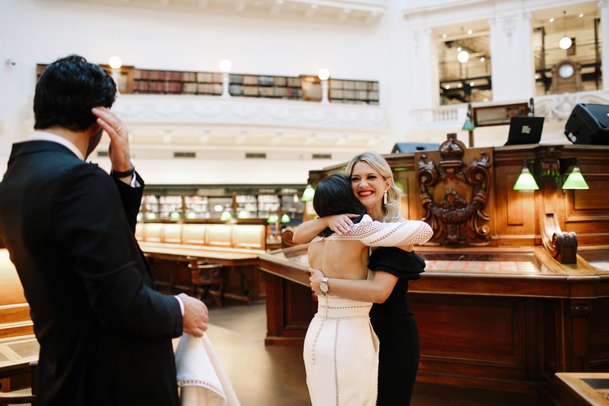 DJ Aleks Mac Hugging A Bride At Her Wedding