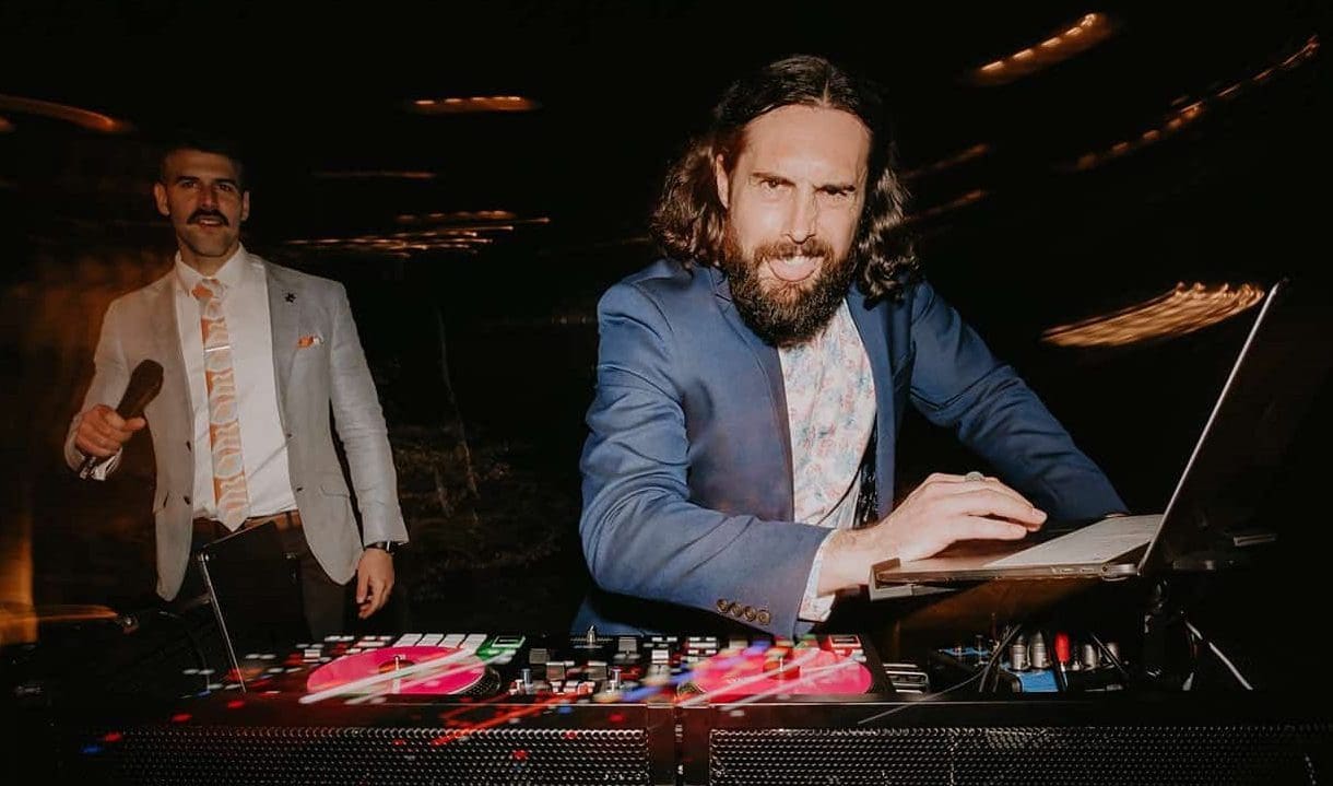 DJ Eddy Mac Behind the Decks at Chris and Natalia's Wedding Photographed by Love Bomb Photos